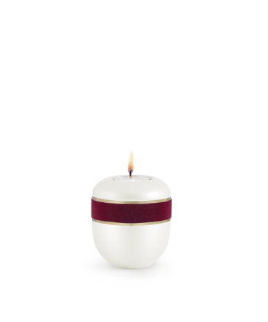 Porseleinen urn wit en rood herdenkingslicht